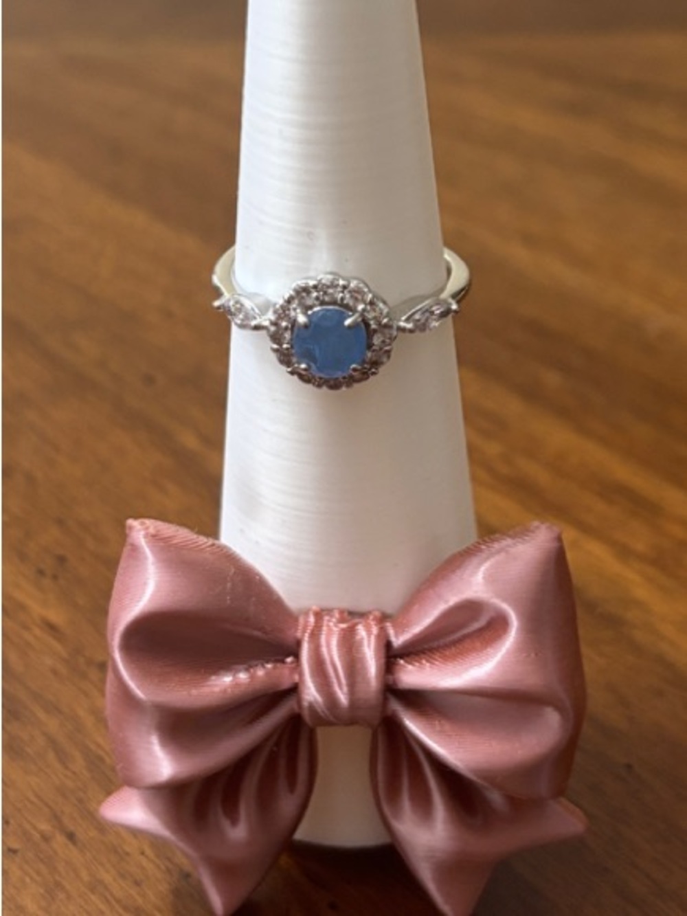 BP Ring with Blue Center Stone and Halo. Size 9.